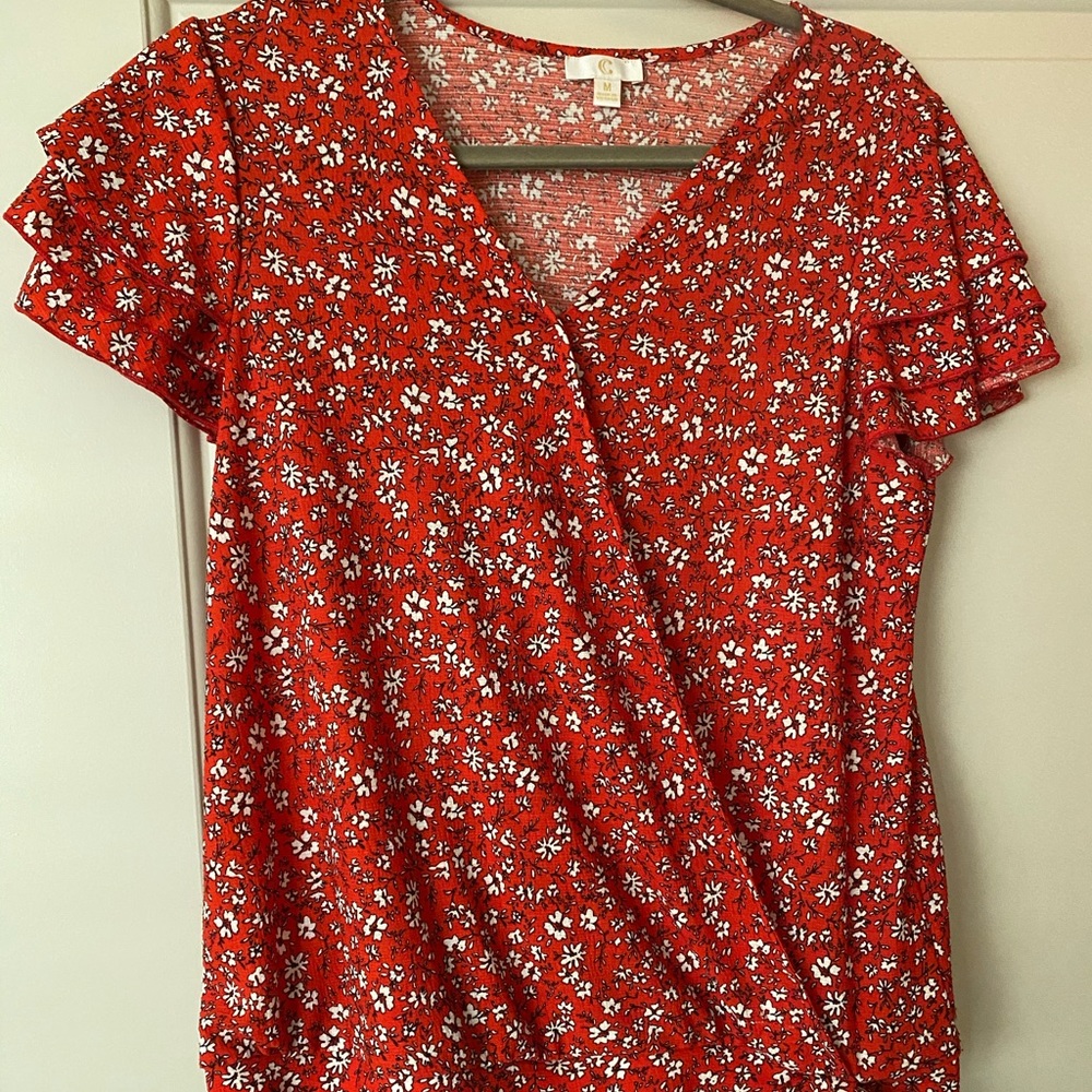 Red floral top with tie at the bottom